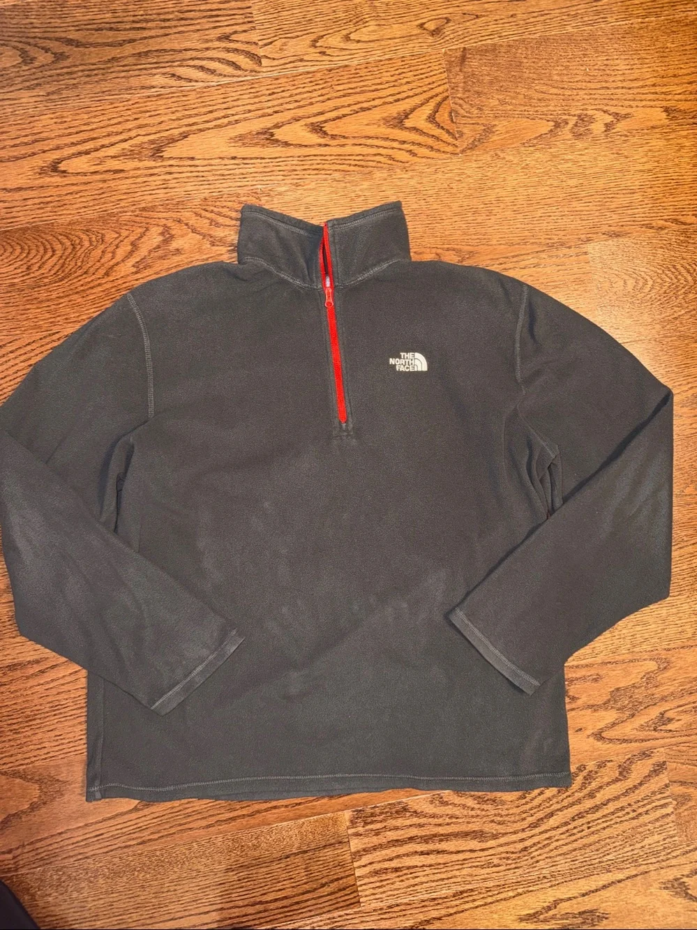 Men’s large charcoal gray 1/4 zip The North Face fleece pullover.